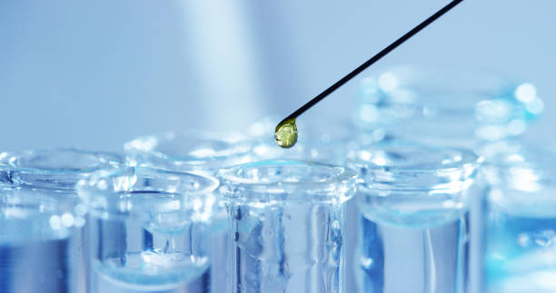 istock In a laboratory, a scientist with a pipette analyzes a colored liquid to extract the DNA and molecules in the test tubes. 1221321770