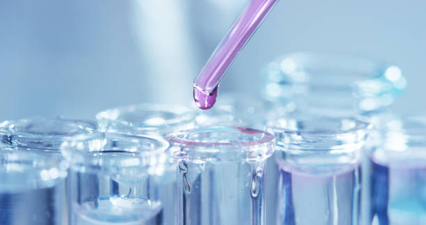 istock In a laboratory, a scientist with a pipette analyzes a colored liquid to extract the DNA and molecules in the test tubes. 1221322080