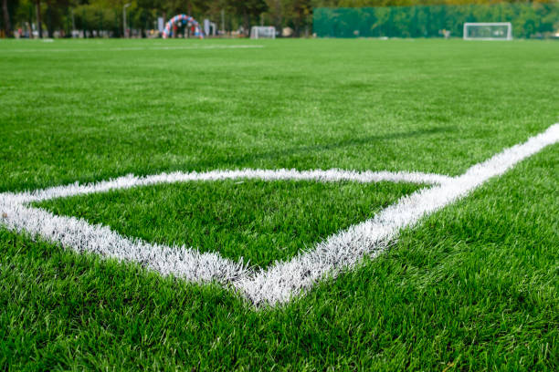 istock empty stadium with artificial football pitch 1221322235