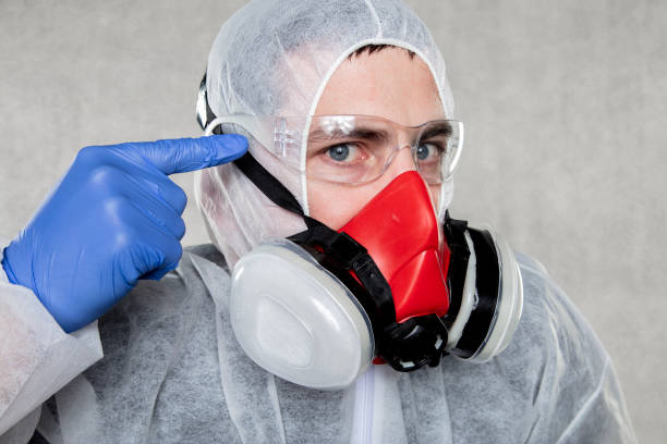 istock portrait of a virologist in a protective suit 1221322355