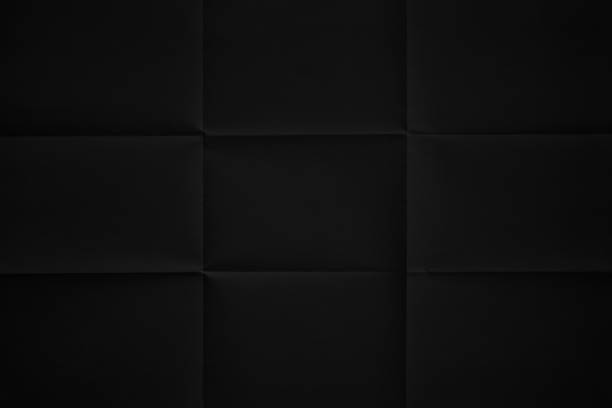 istock Black paper folded in nine fraction background 1221324364