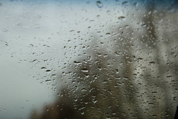 istock The car window is wet with raindrops. 1221324649