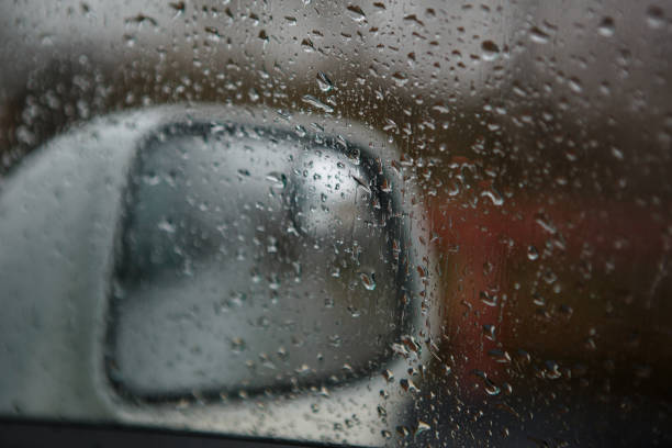 istock The car window is wet with raindrops. 1221324737