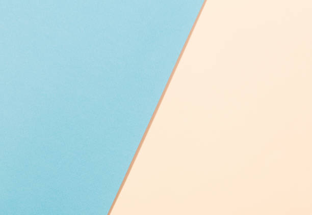 istock blue and beige paper background 1221326659