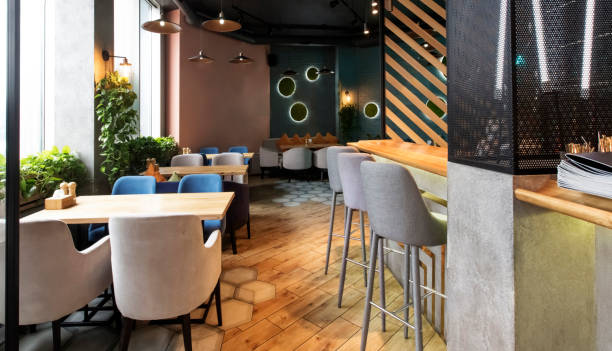 istock Empty restaurant interior while coronavirus pandemic, no people 1221327365