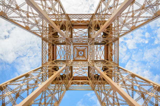 istock Openwork, metal building construction against the sky. Wind resistant. 1221327449