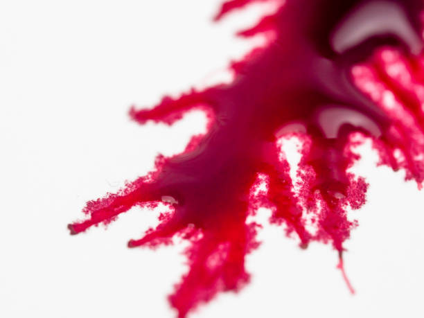 istock red colorl drops. Paint dripping. Dripping liquid.. abstract paint splatter. paint splash set. Color spread.. Color that permeates the paper. blood concept 1221327707