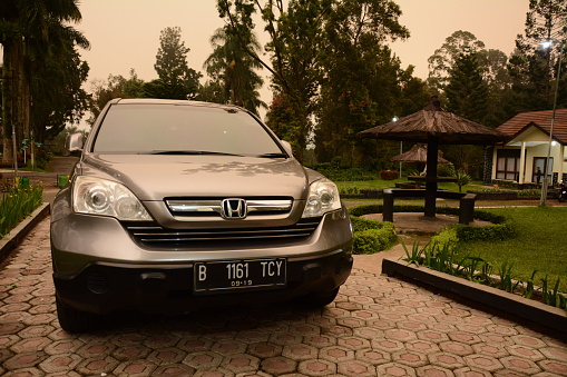 Bogor, Indonesia - February 4, 2019: A honda all-new CRV 2007-2012 series parked next to a building