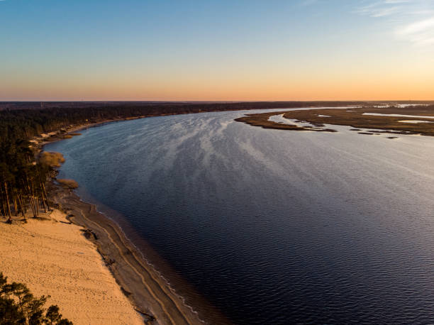 istock Coast riverside view of white dune near Lielupe. 1221337748