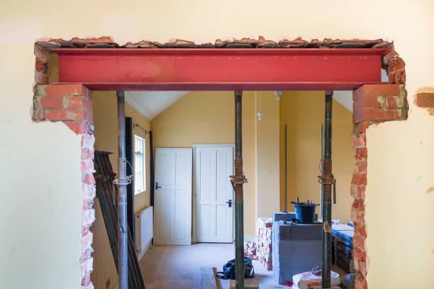House building construction work with RSJ universal steel beam