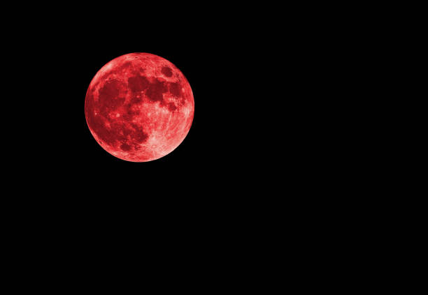istock Red bloody moon on black sky as background, full moon 1221341939