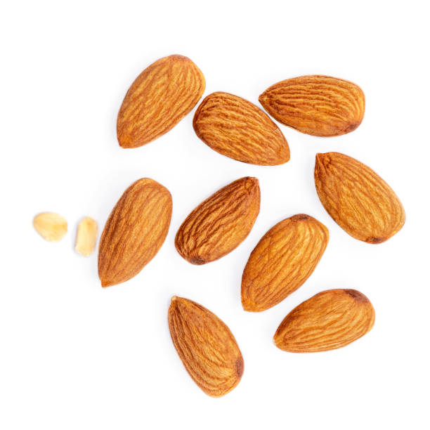 istock Almonds isolated  on white background. Raw Nuts on white background. Collection. Top view. Flat lay