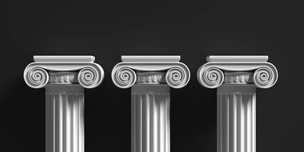 istock Marble pillars columns classic greek against black background. 3d illustration 1221342998