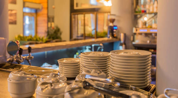 istock Bar counter with clean dishes close up 1221344501