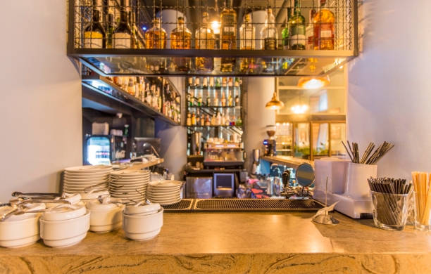 istock Bar counter with elite alcohol and clean dishes for tea 1221346042