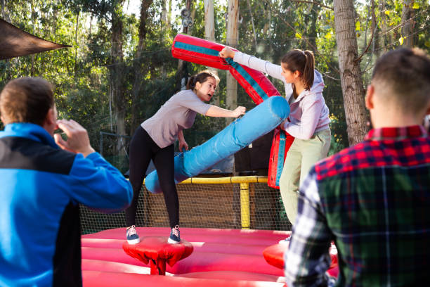 istock Female friends fighting by big stuffed beams 1221347430