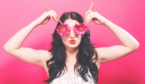 istock Young woman with garbera 1221348119
