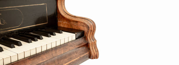 istock Vintage piano keyboard isolated on white background 1221351835