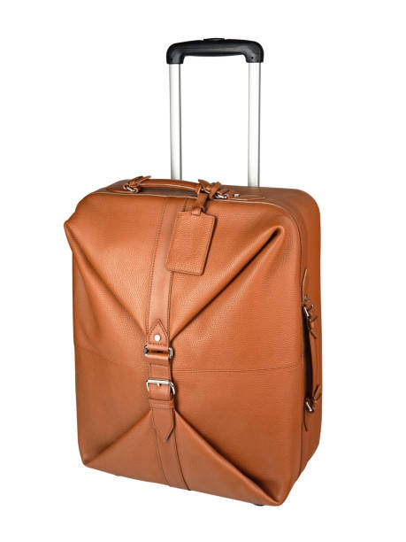 istock Light brown leather travel brown leather suitcase isolated on white 1221354803