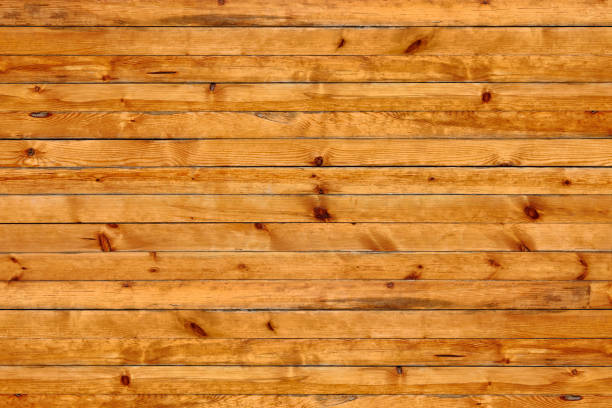 polished pine wooden panel with knots polished pine wooden panel with knots knotted wood wood dirty weathered stock pictures, royalty-free photos & images