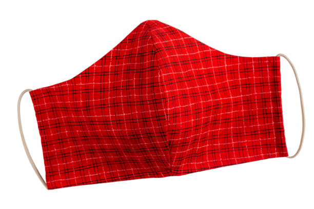 istock Handmade protective face masks. DIY Antivirus cotton mask. Red facemask isolated on white. 1221359201