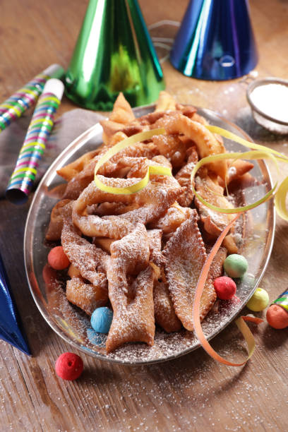 istock fried donut with carnival confetti and decoration 1221360105