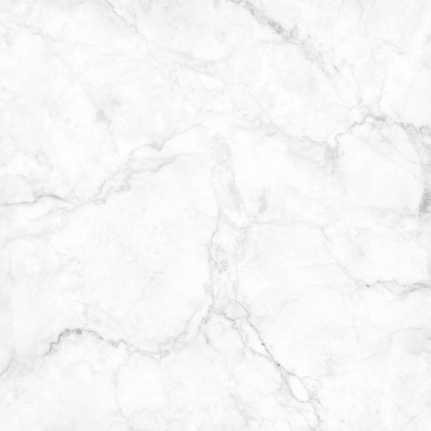 istock White grey marble floor texture background with high resolution, counter top view of natural tiles stone in seamless glitter pattern and luxurious. 1221360364