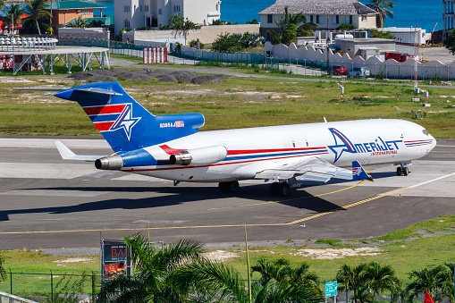 Sint Maarten, Netherland Antilles – September 20, 2016: AmeriJet International Boeing 727-200F airplane at Sint Maarten airport (SXM) in the Netherland Antilles.