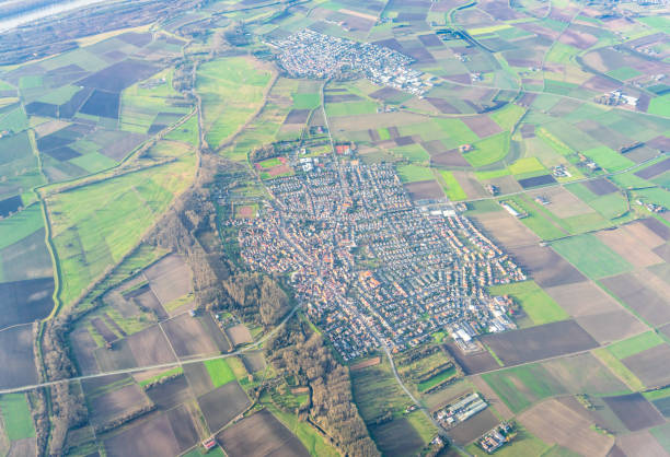 An aerial view of a German town surrounded by arable fields, small farms and villages.