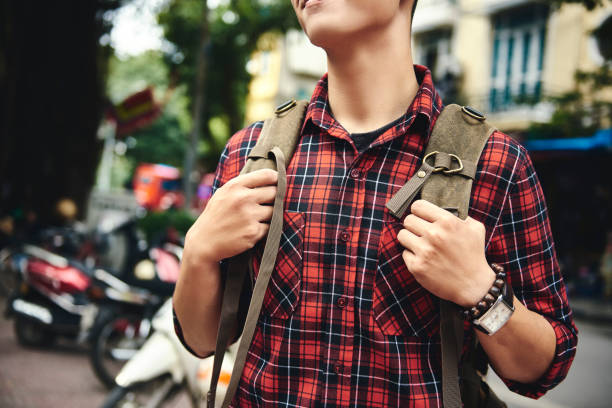 istock Close up of tourist with backpack 1221365356
