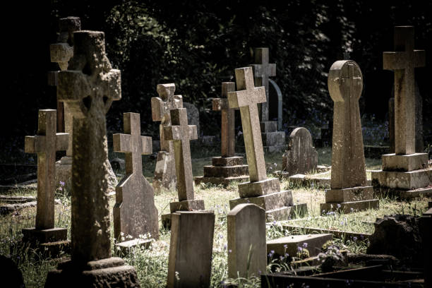 istock Ramshackle gravestones in an old cemetry 1221366226