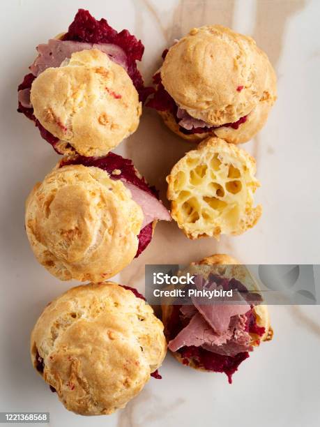 Savory Pate A Choux With Smoked Meat Choux Pastry With Meat French Cheese Choux French Snack Gougere Buns With Cheese And Meat Stock Photo - Download Image Now