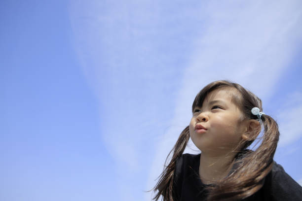 istock Japanese girl under the blue sky (5 years old) 1221368729