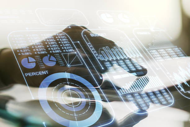 istock Multi exposure of stats data illustration with finger presses on a digital tablet on background, computing and analytics concept 1221372002