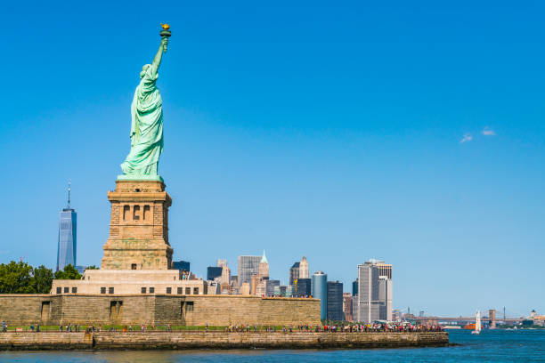 istock The statue of Liberty  with blue sky background. 1221375029