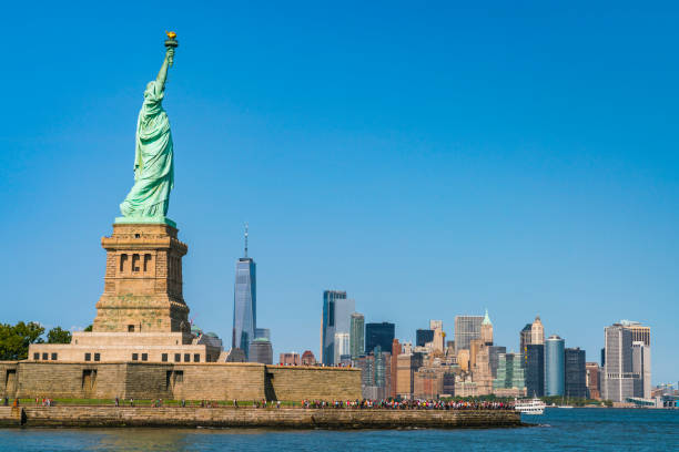 istock The statue of Liberty  with blue sky background. 1221375035