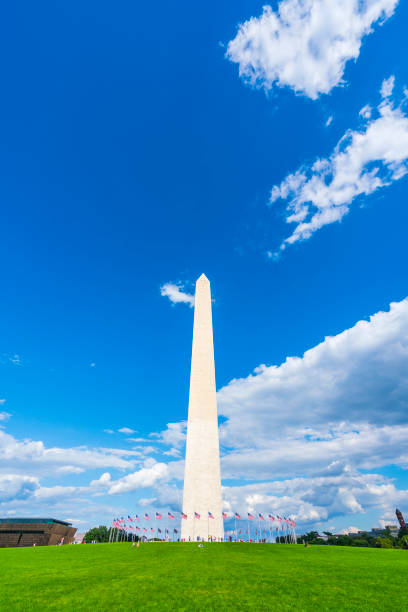 istock washington dc,Washington monument on sunny day with blue sky background. 1221375885