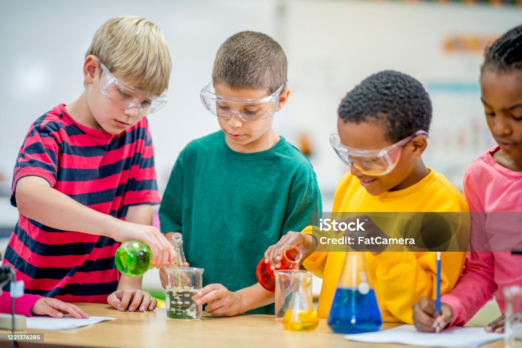 Science Lesson School Elementary Education In The Classroom Doing Science Experiments Stock ...
