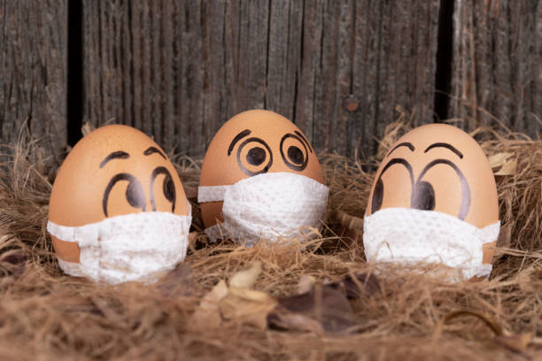 istock Eggs  with medical masks 1221376690