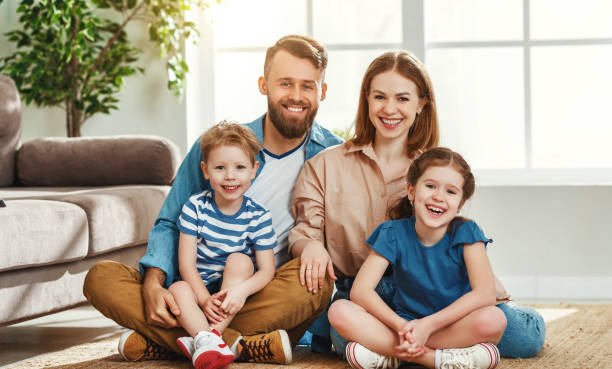 istock Cheerful family spending time together at home 1221378174