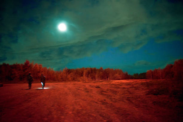 istock Military operations at night. Emergency flare. Signal rocket. 1221378175