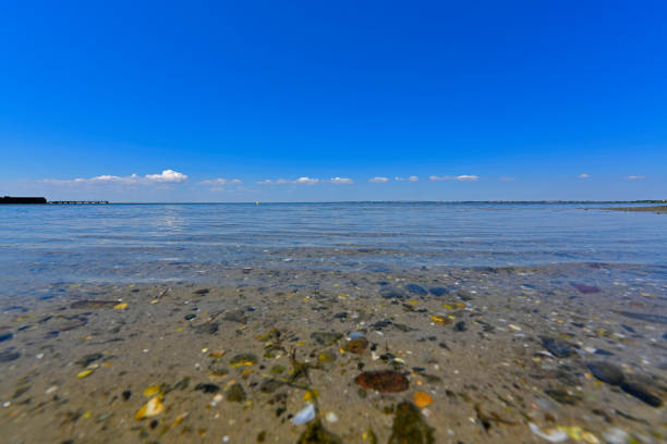 Calm in the sea bay. Berdyansk Spit is located in the north of the Azov Sea, separating the Gulf of Berdyansk from the sea. Currently, the Berdyansk Spit is located in the city limits of Berdyansk.