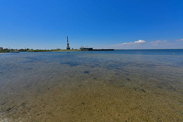 Calm in the sea bay. Berdyansk Spit is located in the north of the Azov Sea, separating the Gulf of Berdyansk from the sea. Currently, the Berdyansk Spit is located in the city limits of Berdyansk.