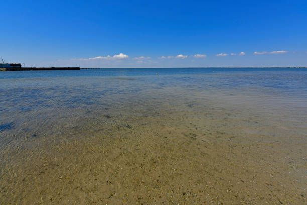 Calm in the sea bay. Berdyansk Spit is located in the north of the Azov Sea, separating the Gulf of Berdyansk from the sea. Currently, the Berdyansk Spit is located in the city limits of Berdyansk.