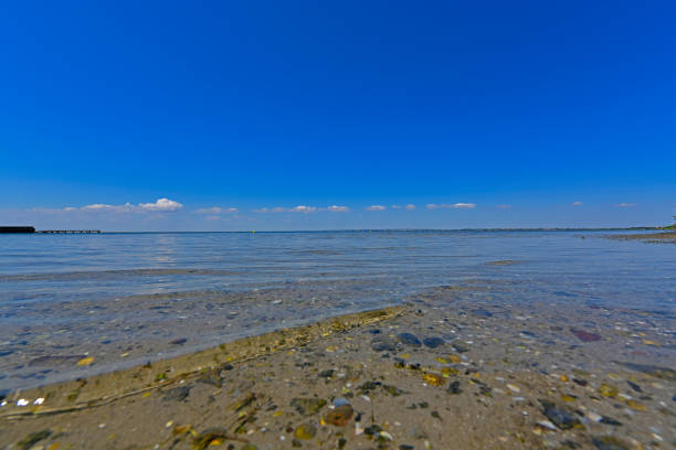 Calm in the sea bay. Berdyansk Spit is located in the north of the Azov Sea, separating the Gulf of Berdyansk from the sea. Currently, the Berdyansk Spit is located in the city limits of Berdyansk.