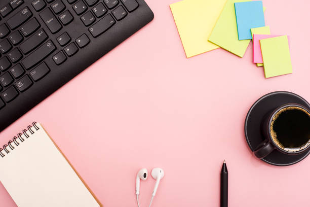 istock Concept of online work. Pink desktop. Freelance. Flat lay. 1221381996