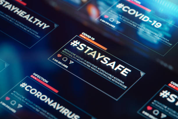 istock #staysafe. Stay safe hashtag close-up on digital display 1221382766