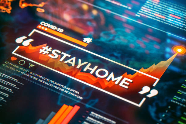istock #stayhome. Stay home hashtag close-up on digital display 1221383067