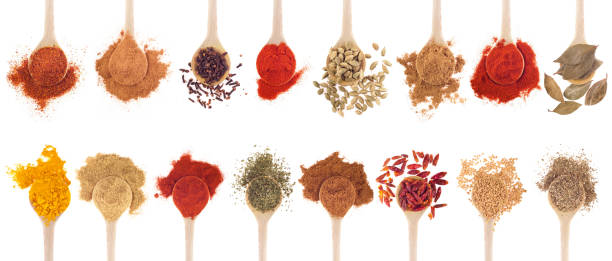 istock A collection of different spices on wooden spoons 122138439