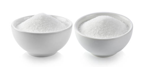 istock white sugar in white bowl on white background 1221385380